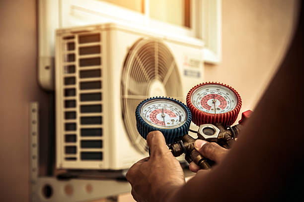 Professional Air Conditioning Service technician working in Jasper, TN
